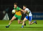 22 January 2022; Ciaran Thompson of Donegal in action against David Garland of Monaghan during the Dr McKenna Cup Final match between Donegal and Monaghan at O'Neill's Healy Park in Omagh, Tyrone. Photo by Oliver McVeigh/Sportsfile