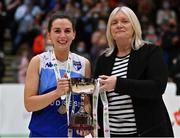 23 January 2022; The Address UCC Glanmire captain Aine McKenna is presented with the cup by Basketball Ireland WNLC chairperson Breda Dick after the InsureMyHouse.ie Paudie O'Connor National Cup Final match between The Address UCC Glanmire, Cork, and DCU Mercy, Dublin, at National Basketball Arena in Tallaght, Dublin. Photo by Brendan Moran/Sportsfile