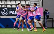 23 January 2022; Stade Francais Paris players celebrate at the full time whistle after their side's victory in the Heineken Champions Cup Pool A match between Stade Francais Paris and Connacht at Stade Jean Bouin in Paris, France. Photo by Seb Daly/Sportsfile