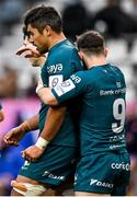 23 January 2022; Jarrad Butler of Connacht, left, is congratulated by teammate Caolin Blade after scoring their side's fourth try during the Heineken Champions Cup Pool A match between Stade Francais Paris and Connacht at Stade Jean Bouin in Paris, France. Photo by Seb Daly/Sportsfile