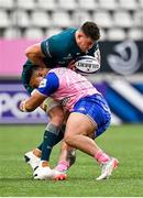 23 January 2022; Oisín Dowling of Connacht is tackled by Tolu Latu of Stade Francais Paris during the Heineken Champions Cup Pool A match between Stade Francais Paris and Connacht at Stade Jean Bouin in Paris, France. Photo by Seb Daly/Sportsfile