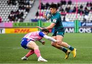 23 January 2022; Alex Wootton of Connacht evades the tackle of Stade Francais Paris' Will Percillier on his way to scoring his side's first try during the Heineken Champions Cup Pool A match between Stade Francais Paris and Connacht at Stade Jean Bouin in Paris, France. Photo by Seb Daly/Sportsfile