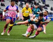23 January 2022; Alex Wootton of Connacht is tackled by Ngani Laumape of Stade Francais Paris on his way to scoring his side's first try during the Heineken Champions Cup Pool A match between Stade Francais Paris and Connacht at Stade Jean Bouin in Paris, France. Photo by Seb Daly/Sportsfile