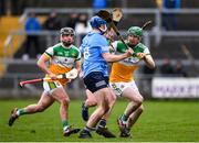 23 January 2022; Eoghan Parlon of Offaly in action against Conor Burke of Dublin during the Walsh Cup Group A match between Offaly and Dublin at St Brendan's Park in Birr, Offaly. Photo by Matt Browne/Sportsfile