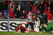 23 January 2022; Andrew Conway of Munster evades the tackle of Will Porter of Wasps to score a try that was subsequently disallowed during the Heineken Champions Cup Pool B match between Munster and Wasps at Thomond Park in Limerick. Photo by Sam Barnes/Sportsfile