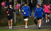 24 January 2022; Nick McCarthy, left, drinks a cup of tea as he arrives with Max Deegan and James Tracy during Leinster Rugby squad training at UCD in Dublin. Photo by Harry Murphy/Sportsfile