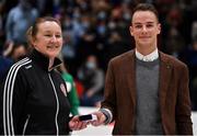 23 January 2022; Referee Tara O'Hanlon is presented with her medal by James Cullen of InsureMyHouse.ie after  the InsureMyHouse.ie Paudie O'Connor National Cup Final match between The Address UCC Glanmire, Cork, and DCU Mercy, Dublin, at National Basketball Arena in Tallaght, Dublin. Photo by Brendan Moran/Sportsfile