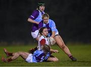 24 January 2022; Abagail Connon of Midlands is tackled by South East players Eve Prendergast, 9, and Aoife Nixon during the Bank of Ireland Leinster Rugby Sarah Robinson Cup Round 2 match between Midlands and South East at Cill Dara RFC in Kildare. Photo by Piaras Ó Mídheach/Sportsfile
