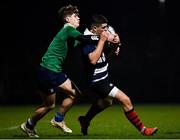 24 January 2022; Sean Tighe of North Midlands is tackled by Neil Byrne of South East during the Bank of Ireland Leinster Rugby Shane Horgan Cup Round 5 match between South East and North Midlands at IT Carlow Sports Campus in Carlow. Photo by Harry Murphy/Sportsfile
