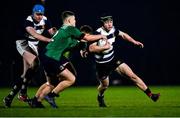 24 January 2022; Eoin Clarke of North Midlands is tackled by Conor Fahy and Padraig Waters of South Eastduring the Bank of Ireland Leinster Rugby Shane Horgan Cup Round 5 match between South East and North Midlands at IT Carlow Sports Campus in Carlow. Photo by Harry Murphy/Sportsfile