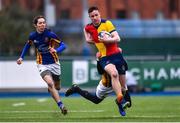 25 January 2022; Luke Ingle of St Fintans High School is tackled by Jack Sweeney of Wilsons Hospital during the Bank of Ireland Vinnie Murray Cup 1st Round match between St Fintans High School, Dublin and Wilsons Hospital, Westmeath at Energia Park in Dublin. Photo by Ben McShane/Sportsfile