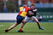 25 January 2022; Padraig Lillis of Wilsons Hospital is tackled by Frank Meenan of St Fintans High School during the Bank of Ireland Vinnie Murray Cup 1st Round match between St Fintans High School, Dublin and Wilsons Hospital, Westmeath at Energia Park in Dublin. Photo by Ben McShane/Sportsfile