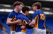 25 January 2022; Tom Wheeler of Wilsons Hospital, centre, celebrates with team-mates Matthew Conlon, left, and Stephen Cahill during the Bank of Ireland Vinnie Murray Cup 1st Round match between St Fintans High School, Dublin and Wilsons Hospital, Westmeath at Energia Park in Dublin. Photo by Ben McShane/Sportsfile