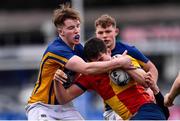 25 January 2022; Charlie Byrne of St Fintans High School is tackled by Matthew Conlon of Wilsons Hospital during the Bank of Ireland Vinnie Murray Cup 1st Round match between St Fintans High School, Dublin and Wilsons Hospital, Westmeath at Energia Park in Dublin. Photo by Ben McShane/Sportsfile