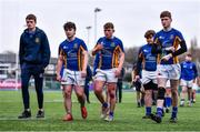 25 January 2022; Wilsons Hospital players leave the pitch after their defeat in the Bank of Ireland Vinnie Murray Cup 1st Round match between St Fintans High School, Dublin and Wilsons Hospital, Westmeath at Energia Park in Dublin. Photo by Ben McShane/Sportsfile