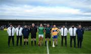 23 January 2022; The Limerick, Barry Nash, and Clare, Jack Browne, captains with referee Conor Doyle and his officials before the 2022 Co-op Superstores Munster Hurling Cup Final match between Limerick and Clare at Cusack Park in Ennis, Clare. Photo by Ray McManus/Sportsfile