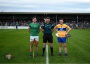 23 January 2022; The Limerick, Barry Nash, and Clare, Jack Browne, captains with referee Conor Doyle before the 2022 Co-op Superstores Munster Hurling Cup Final match between Limerick and Clare at Cusack Park in Ennis, Clare. Photo by Ray McManus/Sportsfile