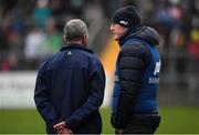 23 January 2022; Clare manager Brian Lohan in conversation with the 4th official near the end of the 2022 Co-op Superstores Munster Hurling Cup Final match between Limerick and Clare at Cusack Park in Ennis, Clare. Photo by Ray McManus/Sportsfile