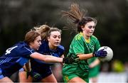 23 January 2022; Grace Connolly of Carrickmacross in action against Aoife Keyes, centre, and Ellie Young of St Judes during the 2021 currentaccount.ie All-Ireland Ladies Junior Club Football Championship Semi-Final match between St Judes, Dublin and Carrickmacross, Monaghan at St Margarets GAA Club in Dublin. Photo by Ben McShane/Sportsfile