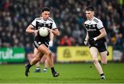 16 January 2022; Dylan Ward, left, and Miceal Rooney of Kilcoo during the AIB Ulster GAA Football Club Senior Championship Final match between Derrygonnelly Harps and Kilcoo at the Athletic Grounds in Armagh. Photo by Ramsey Cardy/Sportsfile