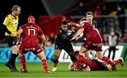 23 January 2022; Paolo Odogwu of Wasps is tackled by Munster players Jack O'Donoghue, bottom, and John Ryan during the Heineken Champions Cup Pool B match between Munster and Wasps at Thomond Park in Limerick. Photo by Piaras Ó Mídheach/Sportsfile
