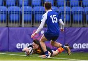 26 January 2022; Rhys Gamble of Temple Carrig scores his side's first try during the Bank of Ireland Vinnie Murray Cup 1st Round match between Temple Carrig, Wicklow and St Andrews College, Dublin at Energia Park in Dublin. Photo by Ben McShane/Sportsfile