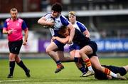 26 January 2022; Karl Moran of St Andrews College is tackled by Patrick Wedgeworth Byrne of Temple Carrig during the Bank of Ireland Vinnie Murray Cup 1st Round match between Temple Carrig, Wicklow and St Andrews College, Dublin at Energia Park in Dublin. Photo by Ben McShane/Sportsfile