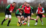 26 January 2022; Cian Prendergast, supported by teammates Tadhg Beirne, left, Rob Herring, Dave Kilcoyne and Craig Casey during Ireland Rugby squad training at IRFU HPC at the Sport Ireland Campus in Dublin. Photo by Brendan Moran/Sportsfile