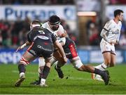 28 January 2022; Marty Moore of Ulster is tackled by Morgan Jones, left, and Sione Kalamafoni of Scarlets during the United Rugby Championship match between Ulster and Scarlets at Kingspan Stadium in Belfast. Photo by David Fitzgerald/Sportsfile
