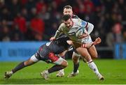 28 January 2022; Billy Burns of Ulster is tackled by Dan Jones of Scarlets during the United Rugby Championship match between Ulster and Scarlets at the Kingspan Stadium in Belfast. Photo by Ramsey Cardy/Sportsfile