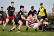 29 January 2022; Fiach Kavanagh of Tullow in action against, from left, Matas Malinovskis, Sean Bracken and Jack McCann, all of Portarlington, during the Bank of Ireland Leinster Rugby Under-18 Tom D’Arcy Cup First Round match between Portarlington RFC and Tullow RFC, Carlow at Portarlington RFC in Portarlington, Laois. Photo by Sam Barnes/Sportsfile