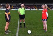 29 January 2022; Referee Kevin Phelan perfoms the coin toss with team captains Bríd O'Sullivan of Mourneabbey and Louise Ward of Kilkerrin-Clonberne before the 2021 currentaccount.ie All-Ireland Ladies Senior Club Football Championship Final match between Mourneabbey and Kilkerrin-Clonberne at St Brendan's Park in Birr, Offaly. Photo by Piaras Ó Mídheach/Sportsfile