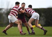29 January 2022; Aaron Prendergast of Portarlington is tackled by Fiach Kavanagh, left, and Adam Burgess of Tullow during the Bank of Ireland Leinster Rugby Under-18 Tom D’Arcy Cup First Round match between Portarlington RFC and Tullow RFC, Carlow at Portarlington RFC in Portarlington, Laois. Photo by Sam Barnes/Sportsfile