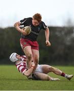 29 January 2022; Killian McHugh of Portarlington is tackled by Conor Kelly of Tullow during the Bank of Ireland Leinster Rugby Under-18 Tom D’Arcy Cup First Round match between Portarlington RFC and Tullow RFC, Carlow at Portarlington RFC in Portarlington, Laois. Photo by Sam Barnes/Sportsfile