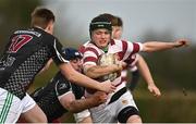 29 January 2022; Mark McDermott of Tullow is tackled by Kyle Stacey, right, and Sean Bracken, both of Portarlington, during the Bank of Ireland Leinster Rugby Under-18 Tom D’Arcy Cup First Round match between Portarlington RFC and Tullow RFC, Carlow at Portarlington RFC in Portarlington, Laois. Photo by Sam Barnes/Sportsfile