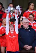 29 January 2022; Kilkerrin-Clonberne captain Louise Ward lifts the Dolores Tyrrell Memorial Cup after her side's victory in the 2021 currentaccount.ie All-Ireland Ladies Senior Club Football Championship Final match between Mourneabbey and Kilkerrin-Clonberne at St Brendan's Park in Birr, Offaly. Photo by Piaras Ó Mídheach/Sportsfile