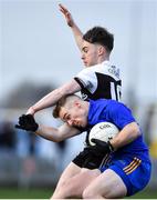 29 January 2022; Eoin McGreevey of St Finbarr's in action against Ceilum Docherty of Kilcoo during the AIB GAA Football All-Ireland Senior Club Championship Semi-Final match between St Finbarr's, Cork, and Kilcoo, Down, at MW Hire O'Moore Park in Portlaoise, Laois. Photo by Brendan Moran/Sportsfile