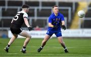 29 January 2022; Eoin McGreevey of St Finbarr's in action against Miceal Rooney of Kilcoo during the AIB GAA Football All-Ireland Senior Club Championship Semi-Final match between St Finbarr's, Cork, and Kilcoo, Down, at MW Hire O'Moore Park in Portlaoise, Laois. Photo by Brendan Moran/Sportsfile