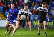 29 January 2022; Ryan Johnston of Kilcoo in action against Conor McCrickard of St Finbarr's during the AIB GAA Football All-Ireland Senior Club Championship Semi-Final match between St Finbarr's, Cork, and Kilcoo, Down, at MW Hire O'Moore Park in Portlaoise, Laois. Photo by Brendan Moran/Sportsfile