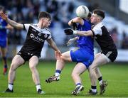29 January 2022; Eoin McGreevey of St Finbarr's is dispossessed by Miceal Rooney of Kilcoo, right, during the AIB GAA Football All-Ireland Senior Club Championship Semi-Final match between St Finbarr's, Cork, and Kilcoo, Down, at MW Hire O'Moore Park in Portlaoise, Laois. Photo by Brendan Moran/Sportsfile