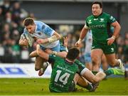 29 January 2022; Sebastian Cancelliere of Glasgow Warriors is tackled by Alex Wootton, 14, and Diarmuid Kilgallen of Connacht during the United Rugby Championship match between Connacht and Glasgow Warriors at the Sportsground in Galway. Photo by Seb Daly/Sportsfile