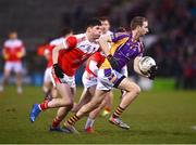 29 January 2022; Ross McGowan of Kilmacud Crokes in action against Shane Carty of Pádraig Pearse's during the AIB GAA Football All-Ireland Senior Club Championship Semi-Final match between Pádraig Pearses, Roscommon, and Kilmacud Crokes, Dublin, at Kingspan Breffni in Cavan. Photo by David Fitzgerald/Sportsfile
