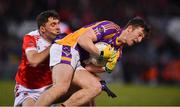 29 January 2022; Hugh Kenny of Kilmacud Crokes in action against Anthony Butler of Pádraig Pearse's during the AIB GAA Football All-Ireland Senior Club Championship Semi-Final match between Pádraig Pearses, Roscommon, and Kilmacud Crokes, Dublin, at Kingspan Breffni in Cavan. Photo by Daire Brennan/Sportsfile