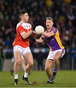 29 January 2022; Conor Daly of Pádraig Pearse's in action against Callum Pearson of Kilmacud Crokes during the AIB GAA Football All-Ireland Senior Club Championship Semi-Final match between Pádraig Pearses, Roscommon, and Kilmacud Crokes, Dublin, at Kingspan Breffni in Cavan. Photo by Daire Brennan/Sportsfile