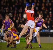 29 January 2022; Callum Pearson of Kilmacud Crokes scores a point over his team-mates Ben Shovlin, left, and Ross McGowan, and despite the effort of Niall Carty of Pádraig Pearse's during the AIB GAA Football All-Ireland Senior Club Championship Semi-Final match between Pádraig Pearses, Roscommon, and Kilmacud Crokes, Dublin, at Kingspan Breffni in Cavan. Photo by Daire Brennan/Sportsfile