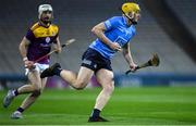 29 January 2022; Daire Gray of Dublin in action against Oisín Foley of Wexford during the Walsh Cup Final match between Dublin and Wexford at Croke Park in Dublin. Photo by Ray McManus/Sportsfile