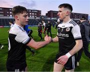 29 January 2022; Ceilum Docherty, left, and Miceal Rooney of Kilcoo celebrate after the AIB GAA Football All-Ireland Senior Club Championship Semi-Final match between St Finbarr's, Cork, and Kilcoo, Down, at MW Hire O'Moore Park in Portlaoise, Laois. Photo by Brendan Moran/Sportsfile