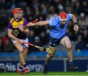 29 January 2022; Paddy Smyth of Dublin is tackled by Oisín Foley of Wexford during the Walsh Cup Final match between Dublin and Wexford at Croke Park in Dublin. Photo by Ray McManus/Sportsfile