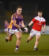 29 January 2022; Shane Cunningham of Kilmacud Crokes in action against Lorcán Daly of Pádraig Pearse's during the AIB GAA Football All-Ireland Senior Club Championship Semi-Final match between Pádraig Pearses, Roscommon, and Kilmacud Crokes, Dublin, at Kingspan Breffni in Cavan. Photo by David Fitzgerald/Sportsfile