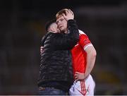 29 January 2022; Paul Carey of Pádraig Pearse's is consoled after the AIB GAA Football All-Ireland Senior Club Championship Semi-Final match between Pádraig Pearses, Roscommon, and Kilmacud Crokes, Dublin, at Kingspan Breffni in Cavan. Photo by David Fitzgerald/Sportsfile